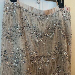 H&M cream sequins and beaded mini skirt.  Size 6 sheer material with lining.